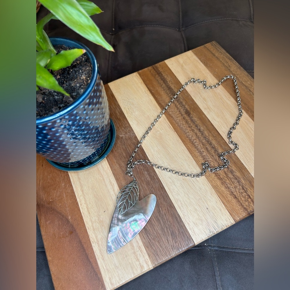 Silver 16” chain with 4” mother of pearl shaped heart and silver leaf charm